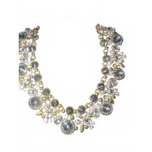 Gold Tone Necklace with Clear and Gray Gemstone Accents missing one stone.